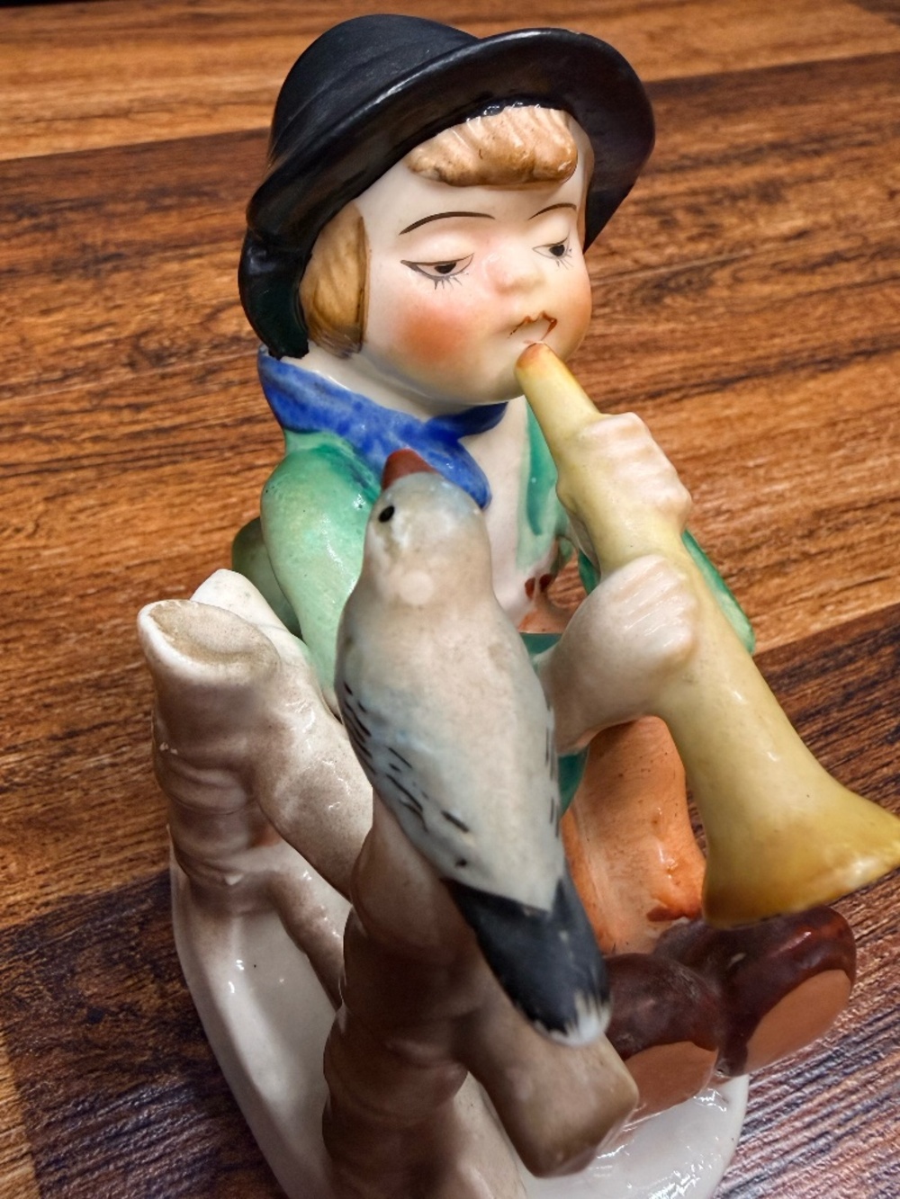 Figurine of Boy Playing Horn - Picture 7 of 15